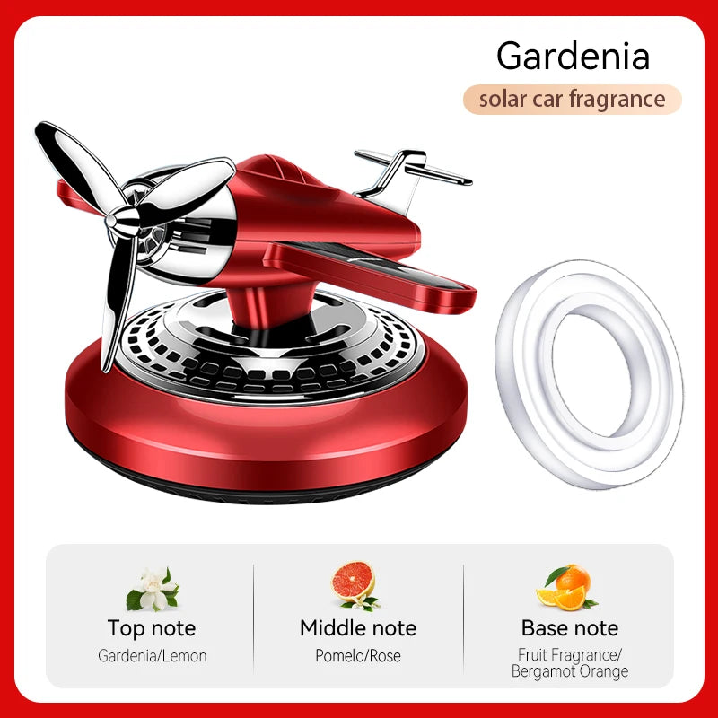 Rotating solar energy powered fighter car air freshener