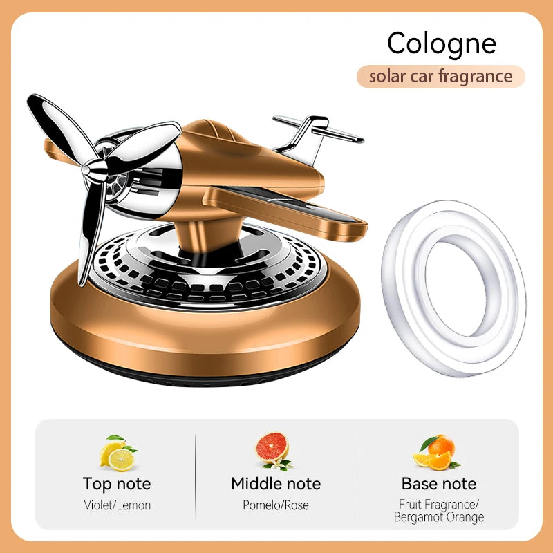 Rotating solar energy powered fighter car air freshener